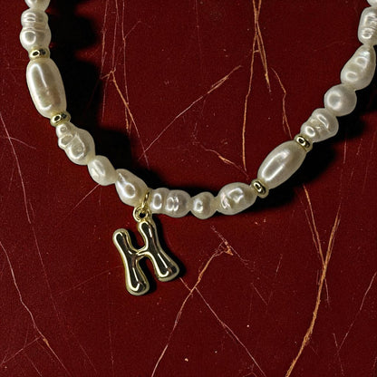 Initiales de perles