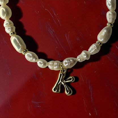 Initiales de perles