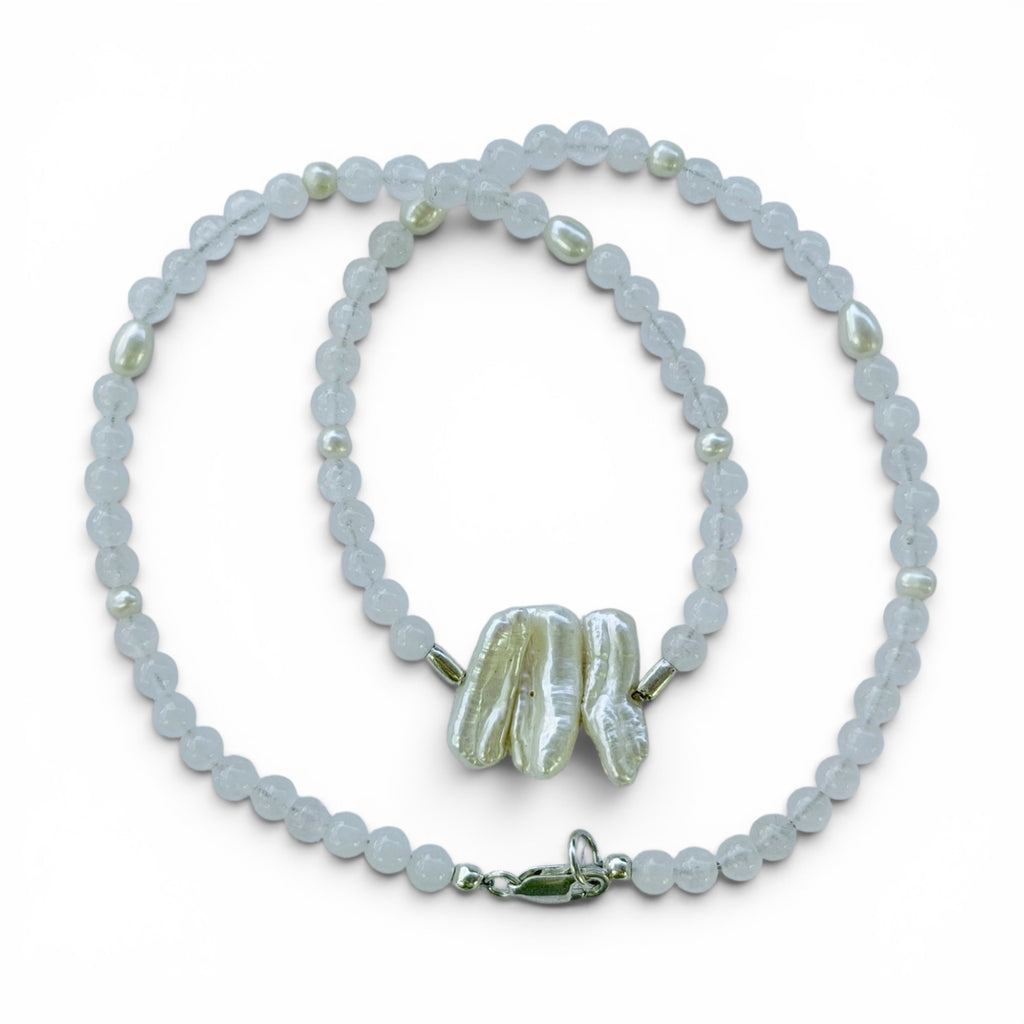 Close-up of Nerida baroque freshwater pearls with white chalcedony and sterling silver details