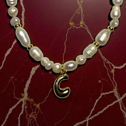 Initiales de perles